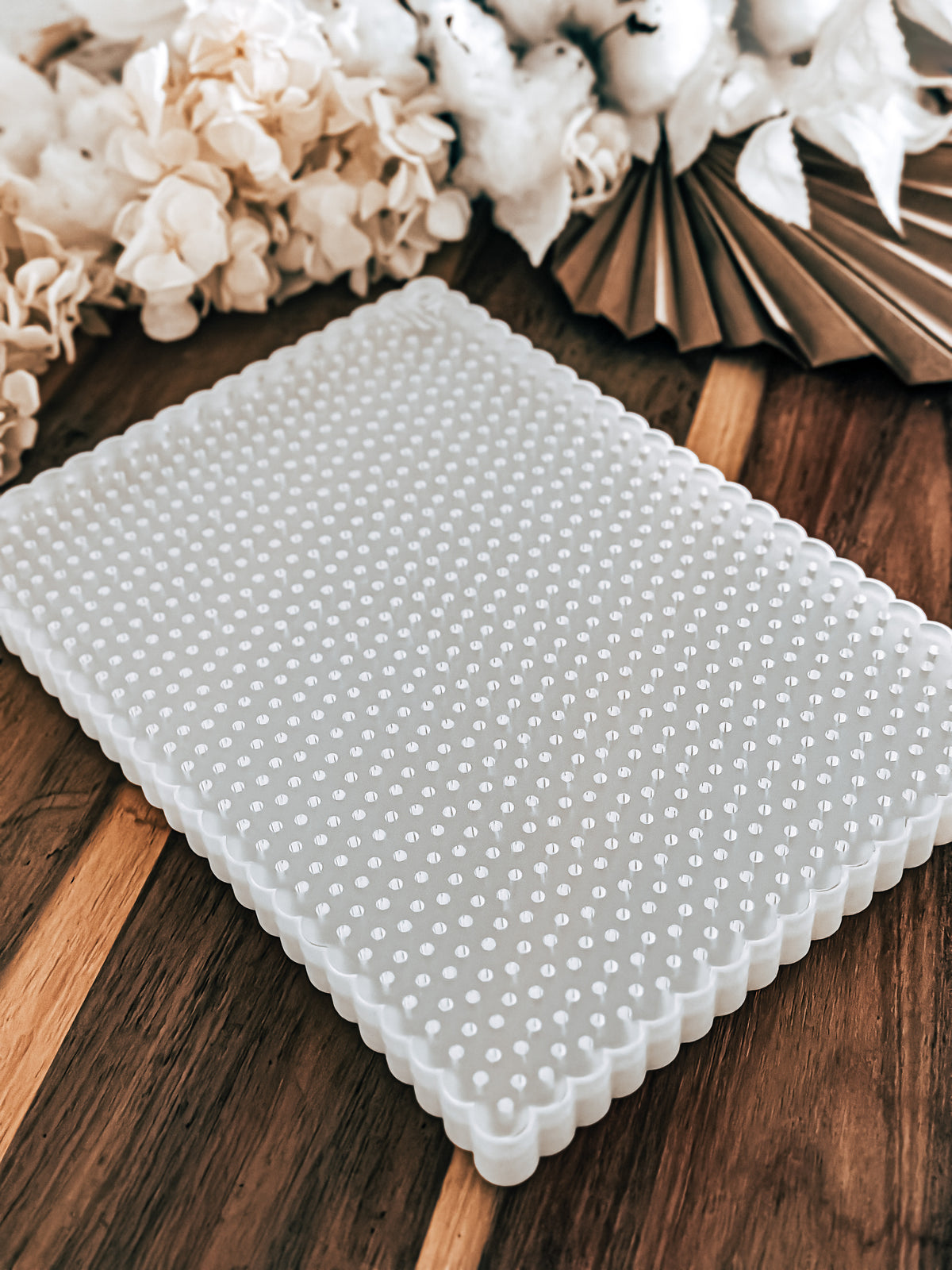 Large Two Tone Plate by O'Khach, angled view of the textured surface for pressing fondant
