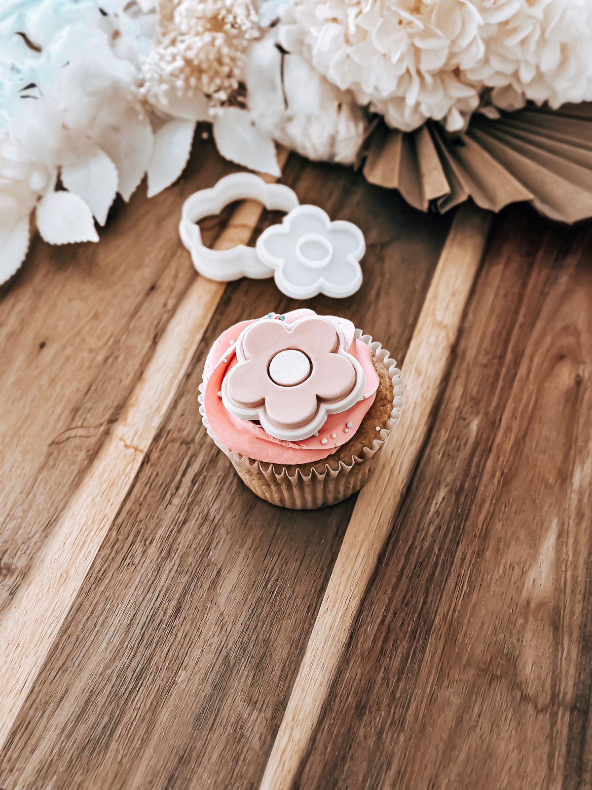 Mini Simple Daisy cookie stamp and cutter by O'Khach, shown stamped in fondant
