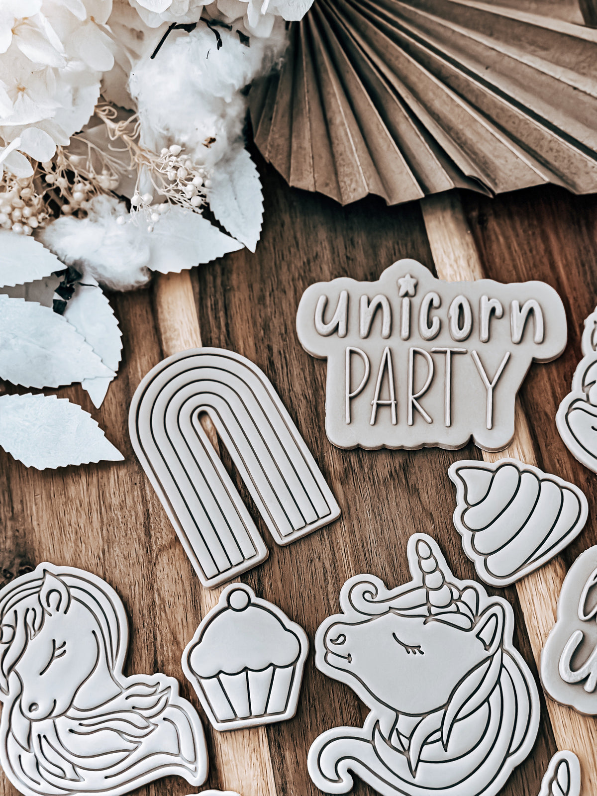 Glitter The Unicorn design stamped in fondant to show the finished cookie