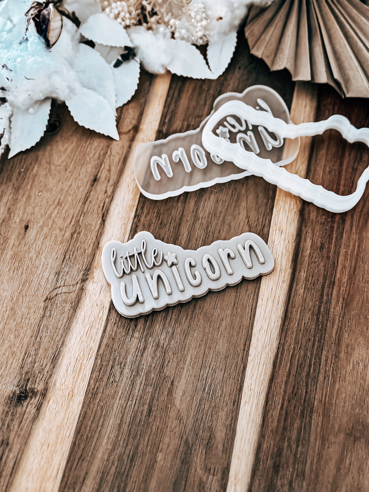 Little Unicorn 'UP' design stamped in fondant, view 3