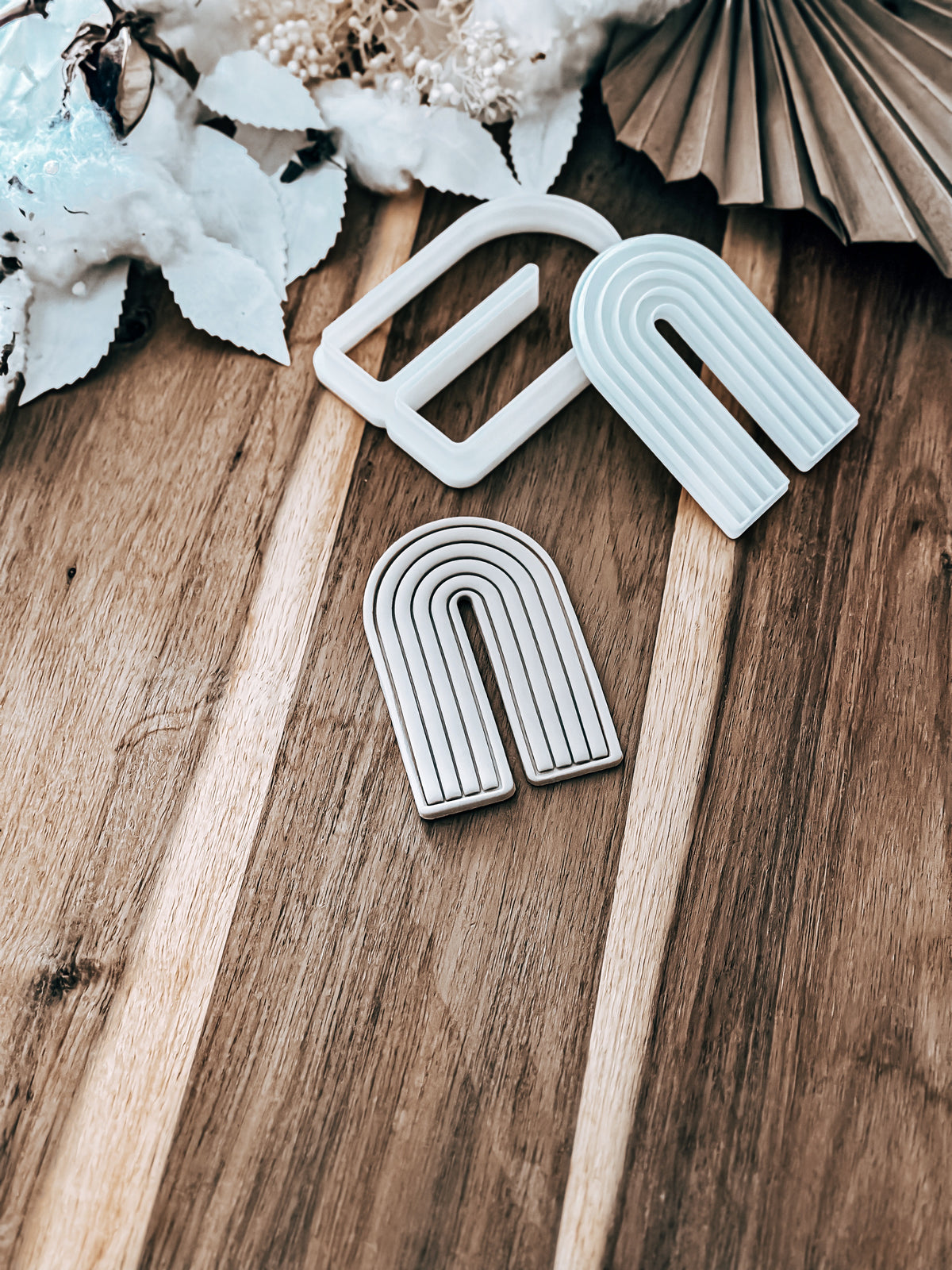 Line Boho Rainbow cookie stamp and cutter by O'Khach, shown stamped in fondant