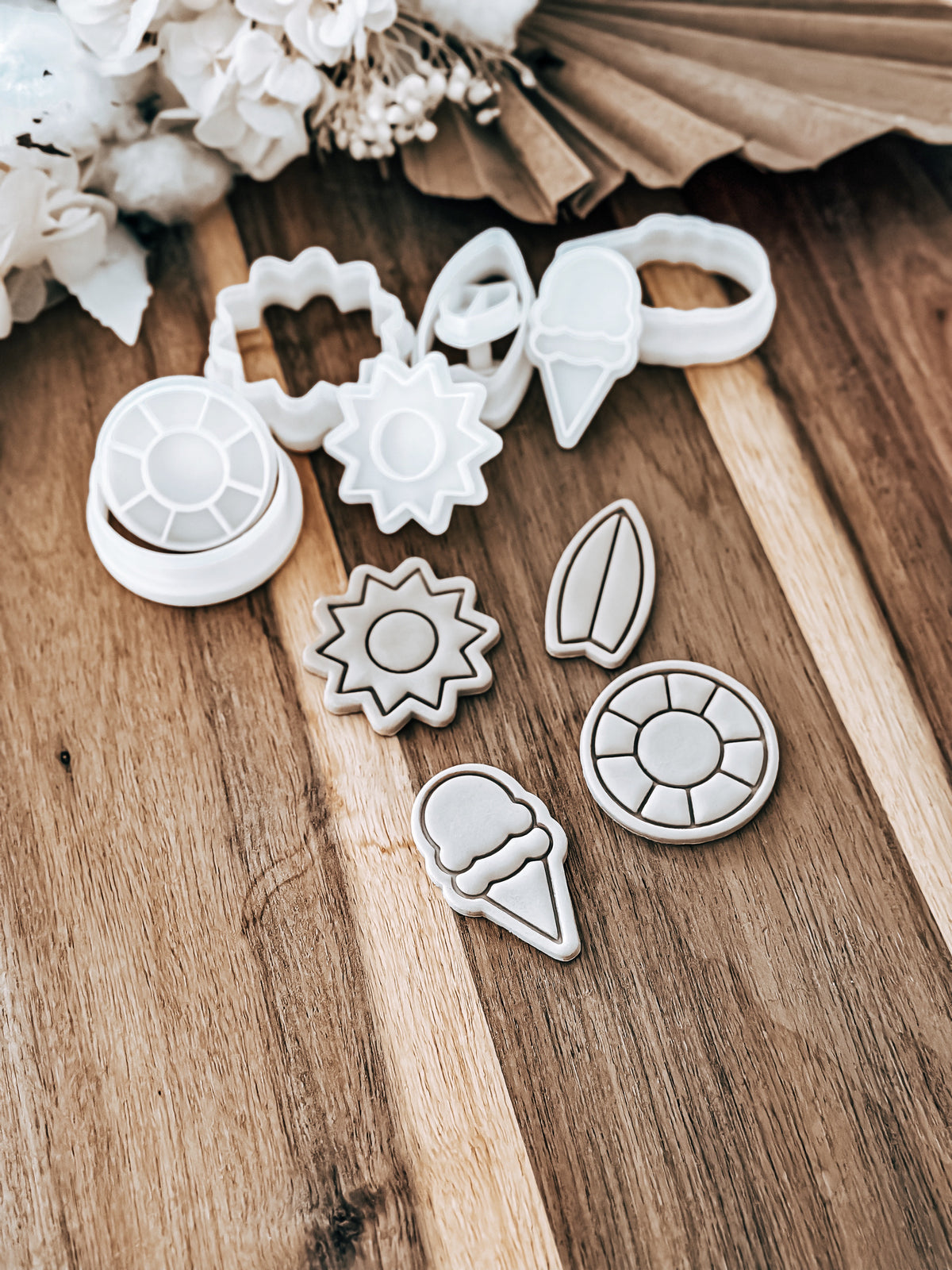 Mini Summer Beach cookie stamps and cutters by O'Khach, shown stamped in fondant