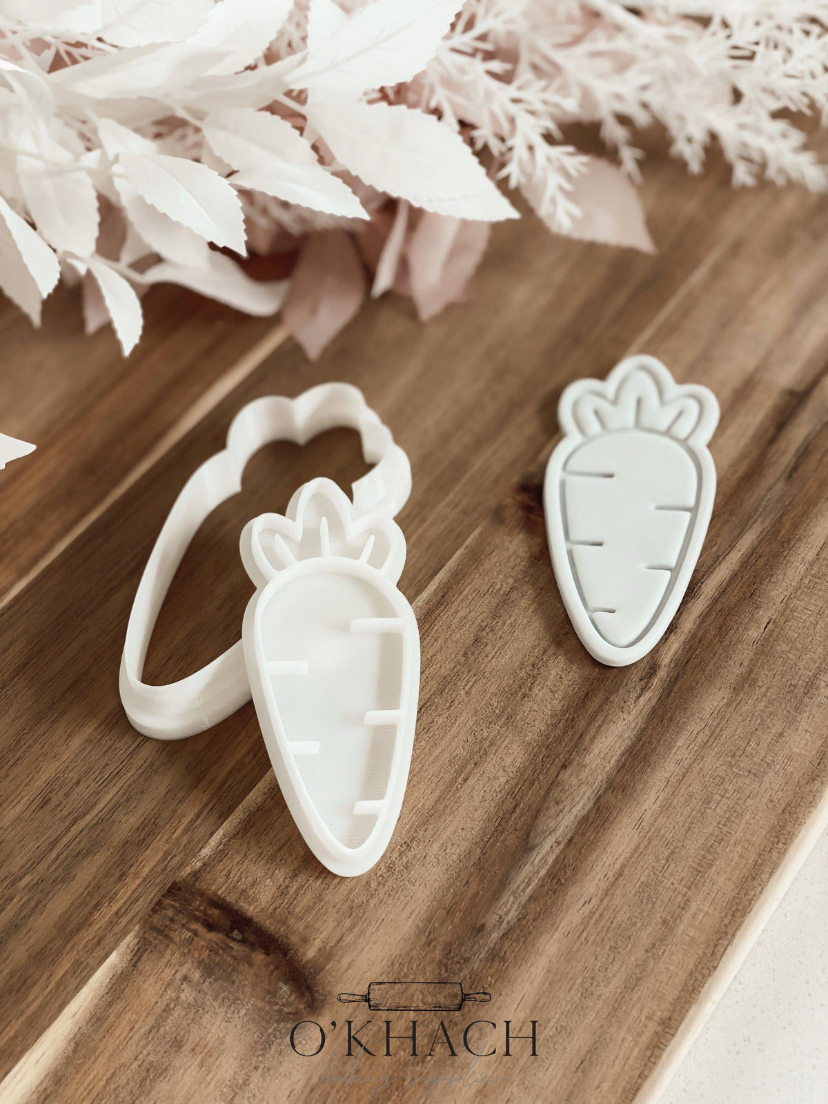 Carrot cookie stamp and cutter by O'Khach, shown stamped in fondant