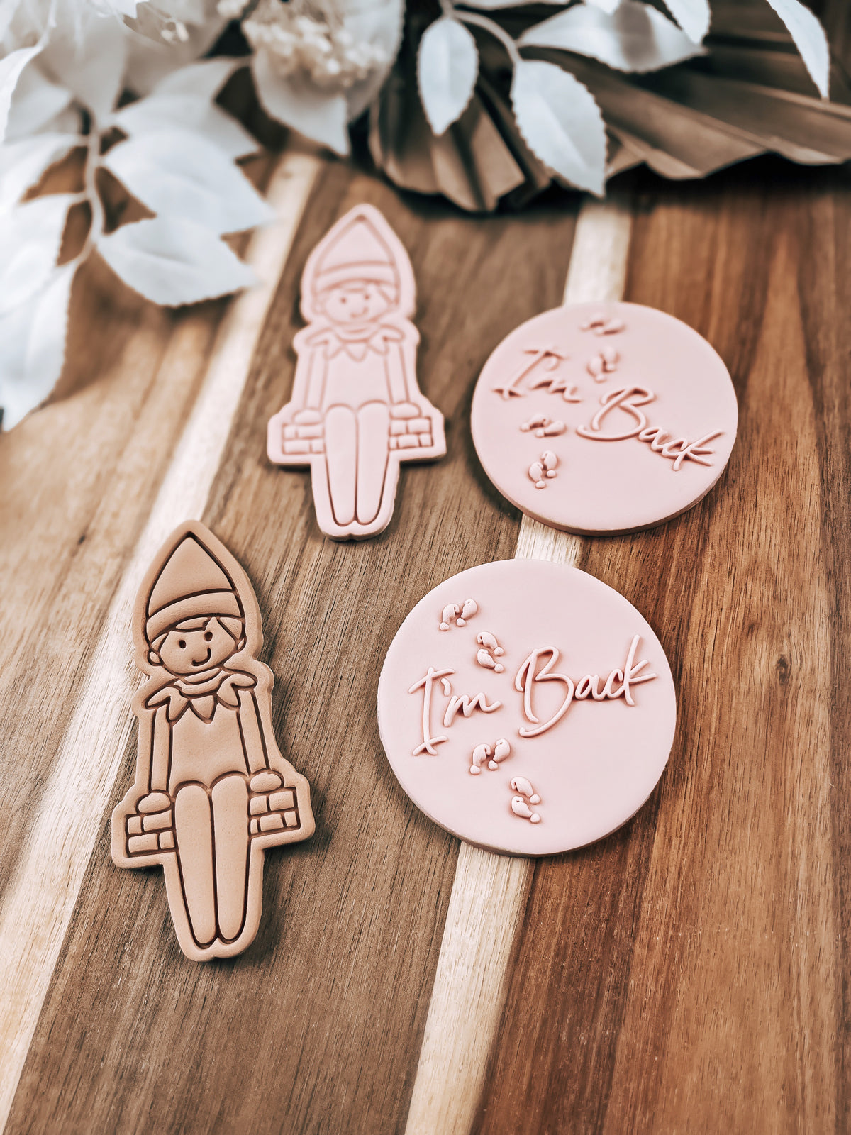 I'm Back 'UP' design stamped in fondant to show the finished cookie