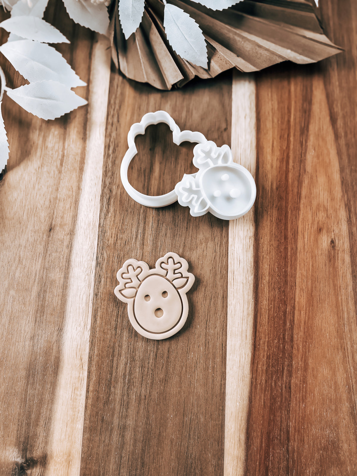 Mini Reindeer design stamped in fondant to show the finished cookie