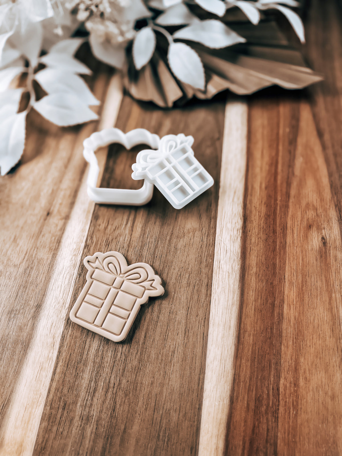 Mini Present design stamped in fondant to show the finished cookie