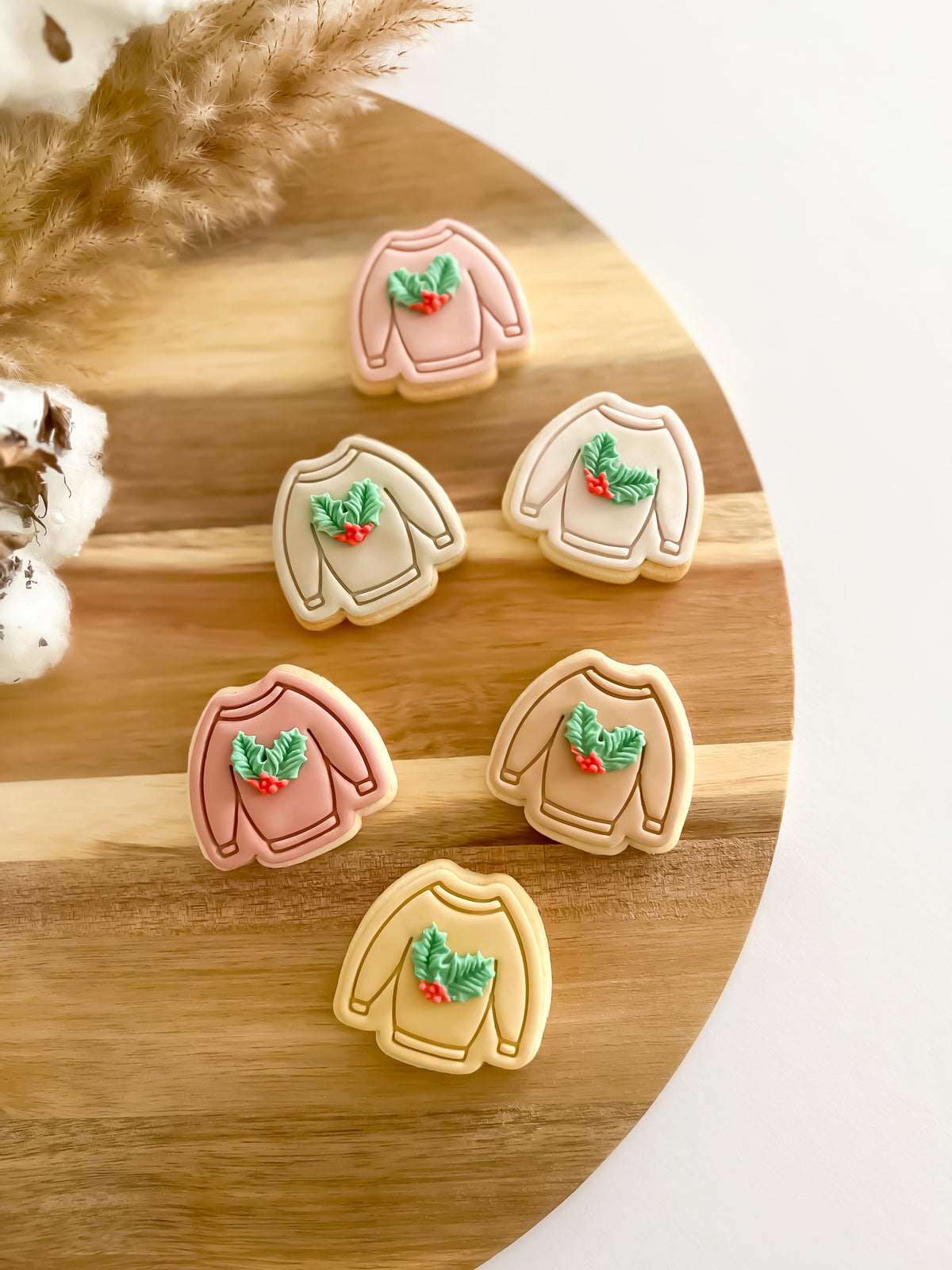Mini Sweater design stamped in fondant to show the finished cookie