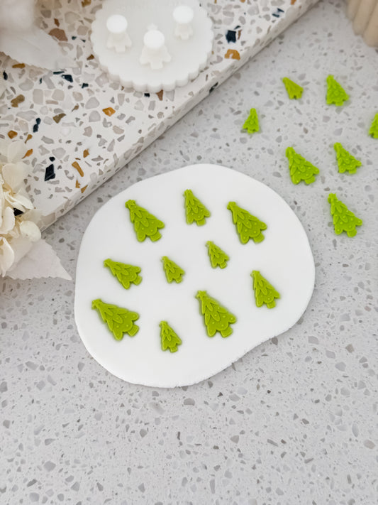 Green fondant Christmas trees made with the Two Tone Press mould by O'Khach Baking Supplies
