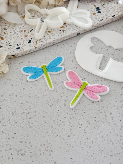Two dragonfly fondant cookies made with the O'Khach Dragonfly stamp and cutter